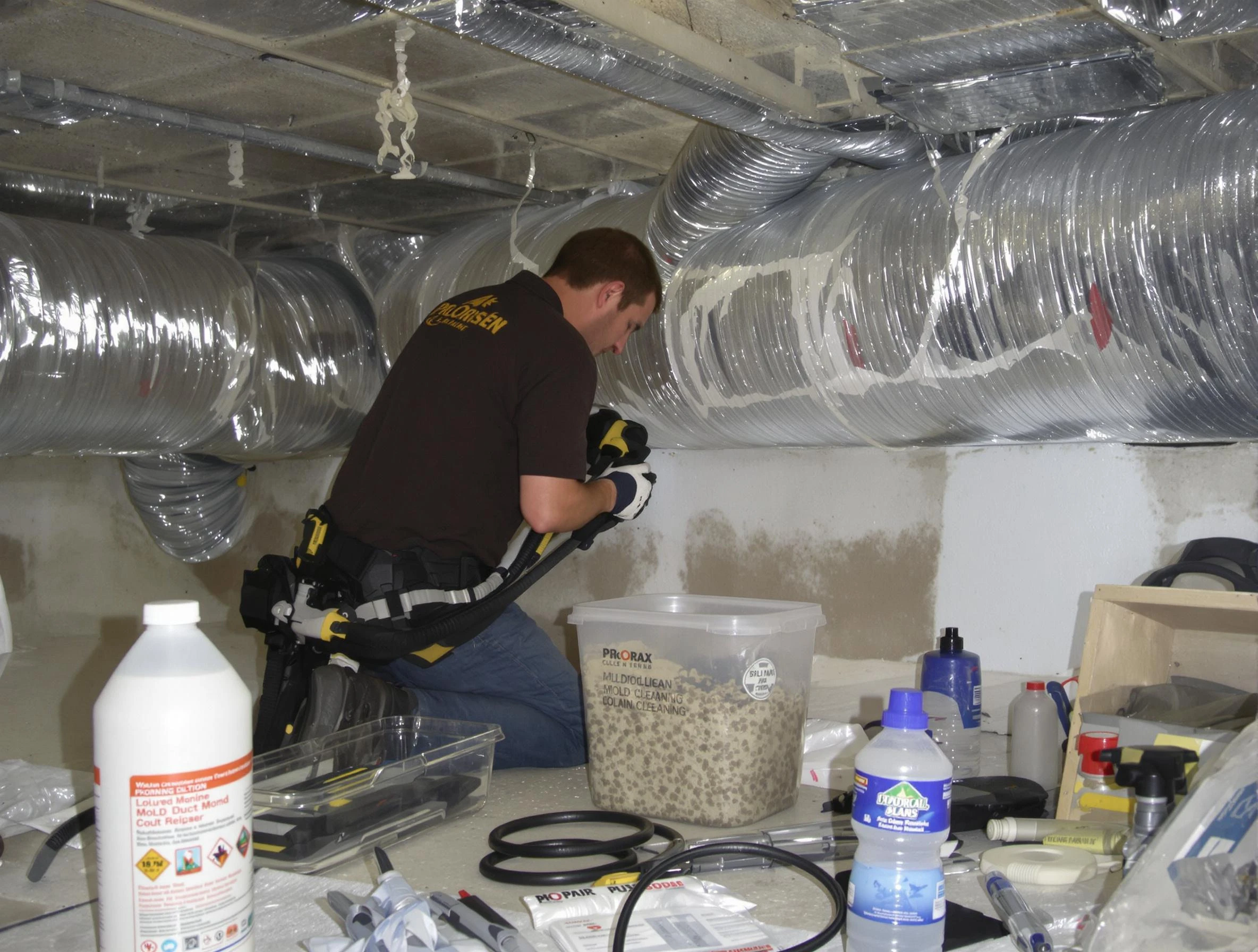 Lawrence Air Duct Cleaning specialist performing professional mold removal from air ducts in Lawrence